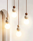 Rile Modern Spherical Travertine and Wood Pendant Light